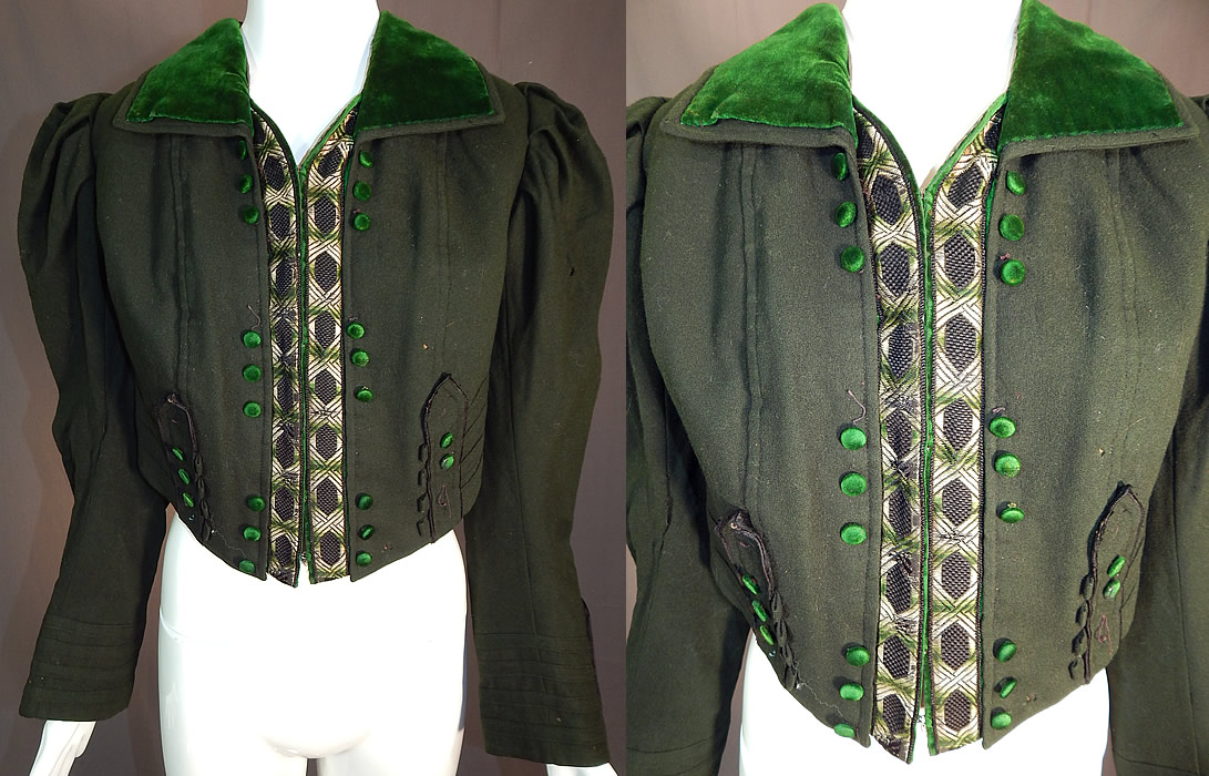 Victorian Dark Green Wool Velvet Trim Short Crop Coat Bolero Jacket
This vintage Victorian era dark green wool velvet trim short crop coat bolero spencer jacket dates from 1900. It is made of a dark green color wool fabric, with a forest green velvet collar, button trim accents and woven silk damask weave brocade ribbon trim front opening.