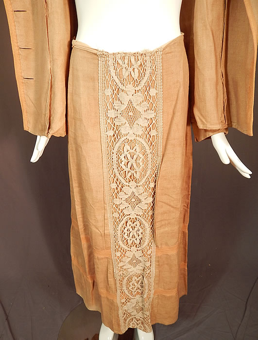 Edwardian Ecru Beige Linen Cream Cluny Lace Walking Suit Jacket Skirt
There is a matching fabric long floor length skirt, with a lace trim front, pleating, hook closures on the back and is unlined. 