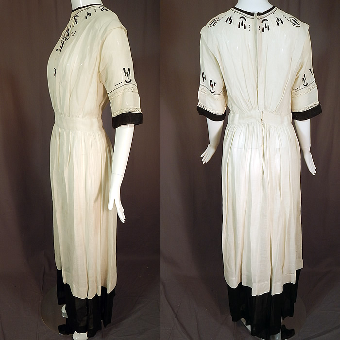 Edwardian Black White Muslin Cotton Arts & Crafts Embroidered Lace Dress
This stunning summer dress is a long floor length with a wide black muslin trim hemline, short sleeves. a fitted waistband, mother of pearl button closures hidden down the back and is sheer, unlined.