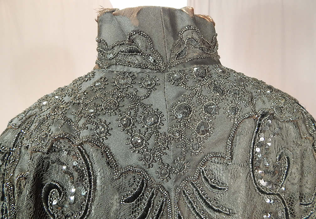 Victorian Hubert & Riqueur Paris Label Black Silk Lace Jet Beaded Mantle Cloak Cape
The cape measures 36 inches long, 26 inches wide across the back shoulders, with a 14 inch neck. 