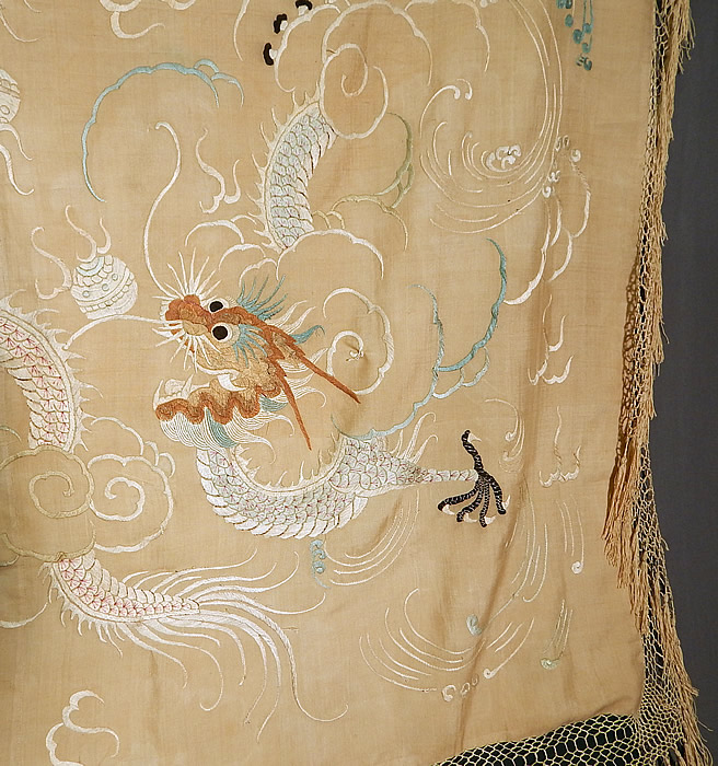 Antique Chinese Dragon Pongee Raw Silk Embroidery Fringe Shawl Tablecloth Tapestry
This square shawl style tablecloth tapestry has a fine hand knotted macramé silk fringe trim measuring 6 inches long surrounding the entire shawl and is fully lined, backed in a silk fabric.