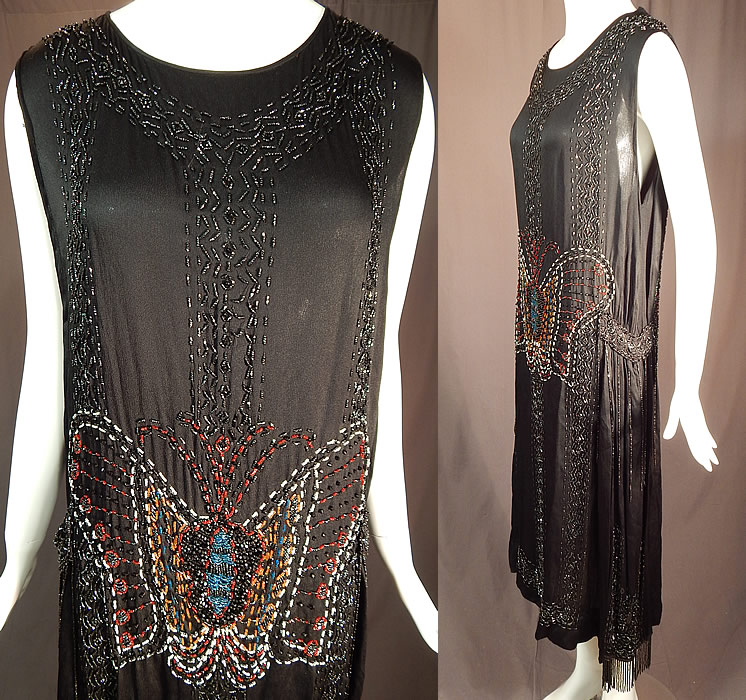 Vintage Art Deco Black Silk Colorful Beaded Butterfly Fringed Flapper Dress
There are pearl beaded accents on the back butterfly and black beaded fringe along the sides. 