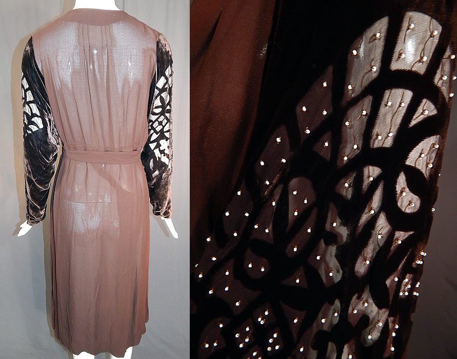 Vintage Brown Silk Crepe Devore Voided Velvet Beaded Sleeve Bias Cut Dress
. The dress measures 44 inches long, with a 38 inch bust, 34 inch waist and 44 inch hips. It is in good condition, with only some slight fade discoloration on the skirt. This is truly a wonderful piece of wearable textile art!