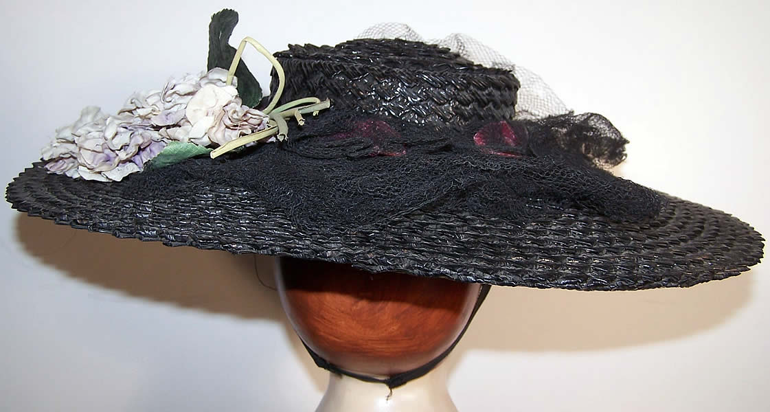 Black Straw Lilac Flower Wide Brim Cartwheel Hat side view.