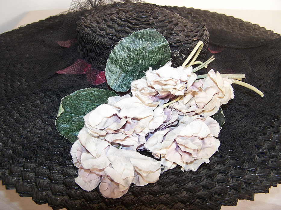 Black Straw Lilac Flower Wide Brim Cartwheel Hat Close up.