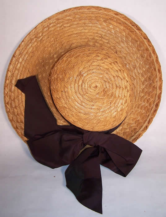 Natural Straw Black Net Wide Brim Bow Sailor Hat Close up.