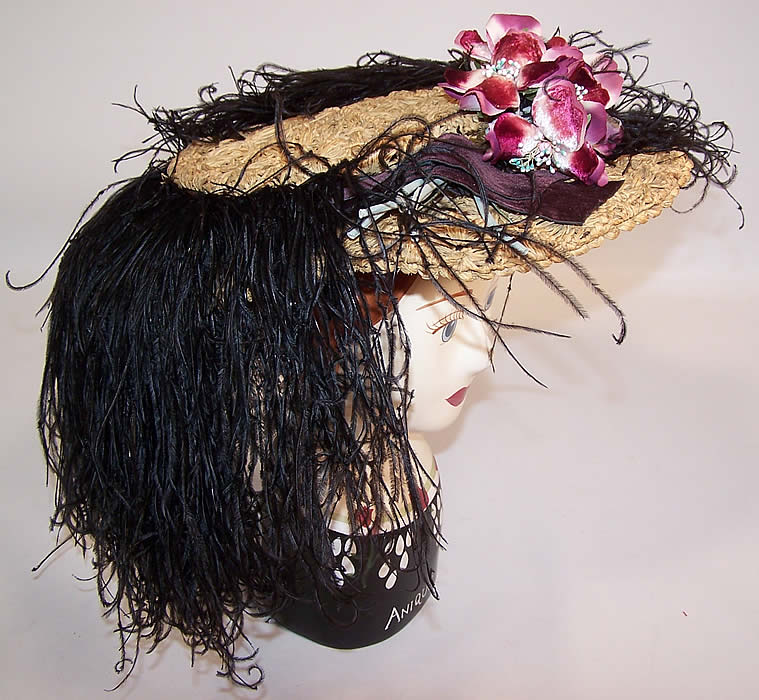 Belle Epoque Edwardian Natural Straw Raffia Wide Brim Ostrich Feather Hat side view.