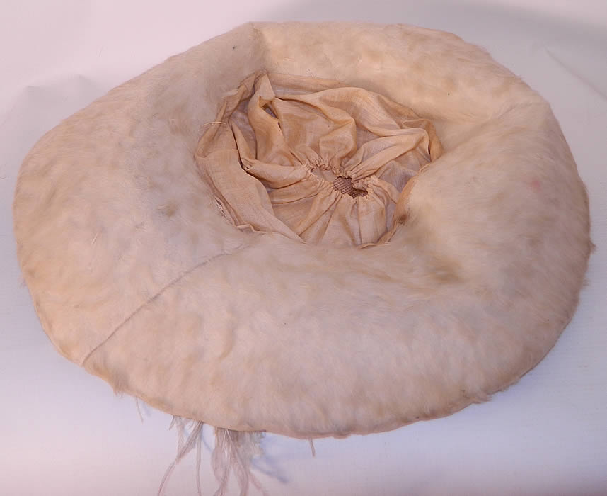 Edwardian Titanic Cream Velvet White Beaver Felt Fur Feather Wide Brim Hat. It is lined inside the crown in white cotton. The hat measures 24 inches inside crown circumference and is 47 inches outside. 