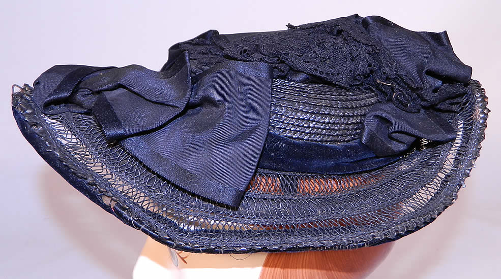 Victorian Woven Black Straw Silk Ribbon Lace Mourning Bonnet Hat. It is made of a wired framed covered with a basket weave tightly woven black straw crown and loosely woven open lattice work brim, with black silk grosgrain ribbon, midnight blue velvet and black lace trim gathered on top.