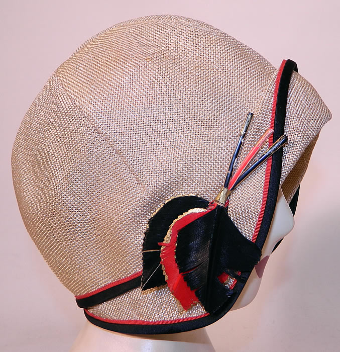 Vintage Flo Lill Art Deco Red, Black & White Straw Feather Flapper Cloche Hat. This fabulous flapper cloche style hat is form fitting, with an uneven asymmetrical rolled brim. 