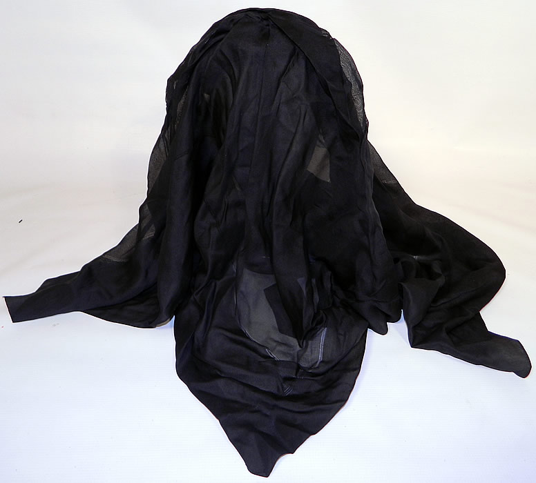 Victorian Woven Black Straw Layered Silk Veil Full Mourning Bonnet Hat. The bonnet measures 7 inches tall, 8 inches wide, with a 36 inch long veil. It is in good condition. 