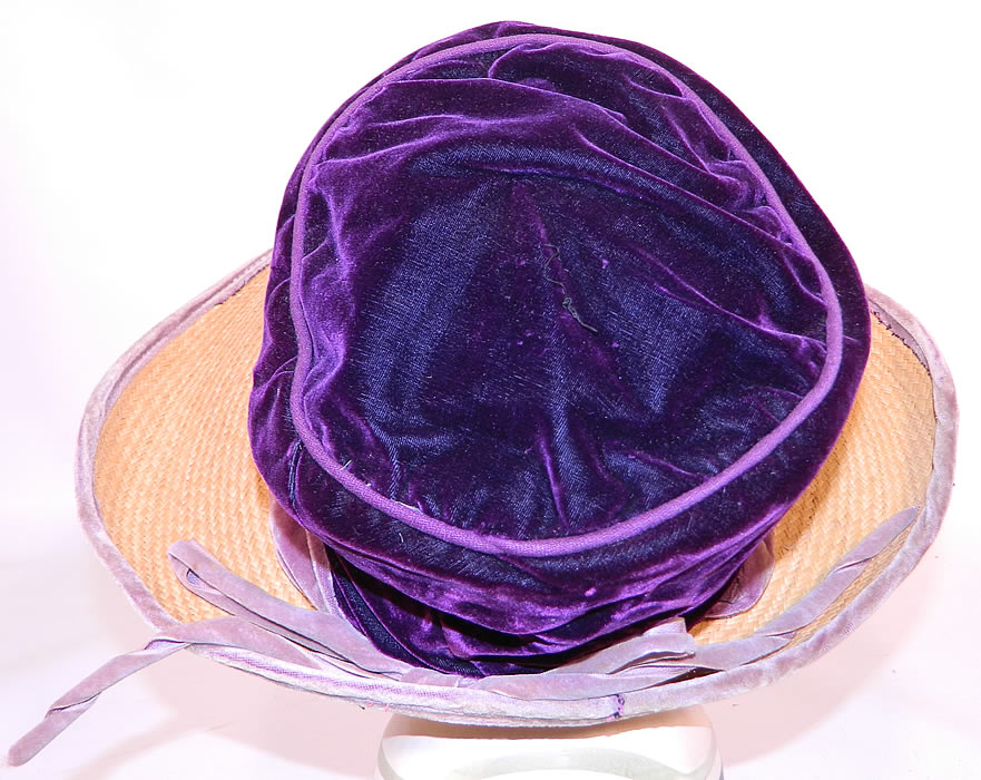 Vintage Natural Straw Wide Brim Purple Velvet Crown Cloche Hat. It is lined with a sheer white silk fabric inside. The hat measures 22 inches inside crown circumference and is 40 inches outside. 