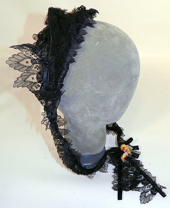 Victorian Civil War Era Black Chantilly Lace Floral Trim  Fanchon Bonnet Headdress. This fabulous fanchon bonnet  headdress has a short brim, back curtain and long lace lappet ribbon chin straps.