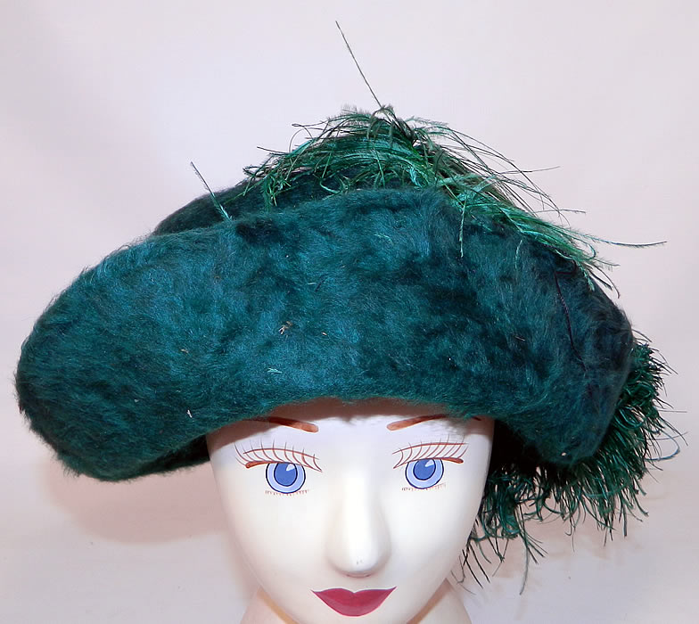 Edwardian Titanic Era Green Beaver Felt Fur Ostrich Feather Rolled Brim Hat. This antique Edwardian Titanic era green beaver felt fur ostrich feather rolled brim hat dates from 1912. 