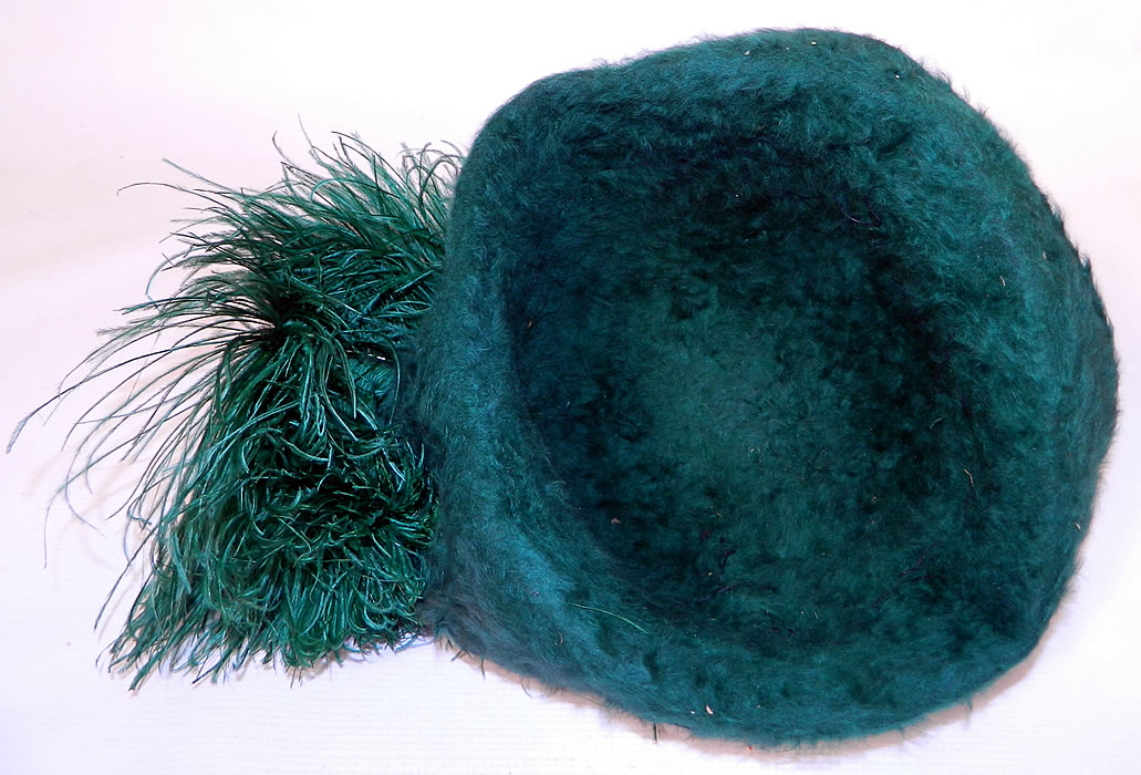 Edwardian Titanic Era Green Beaver Felt Fur Ostrich Feather Rolled Brim Hat. The hat measures 25 inches in circumference inside the crown. It is in excellent  wearable condition. This is truly a rare gorgeous green color and  grand  hat!