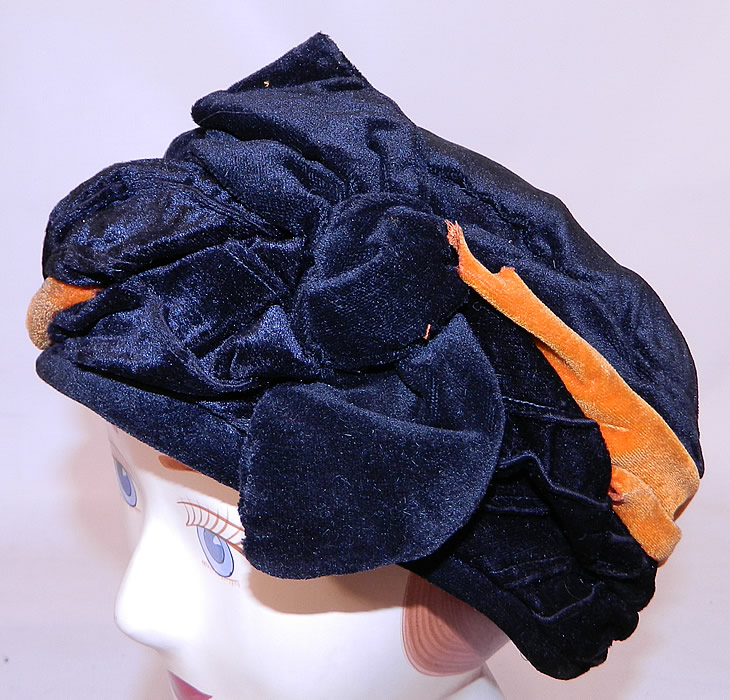 Vintage Art Deco Black & Orange Velvet Knotted Bow Trim Flapper Cloche Hat. This vintage Art Deco black and orange velvet knotted bow trim flapper cloche hat dates from the roaring 1920s. 