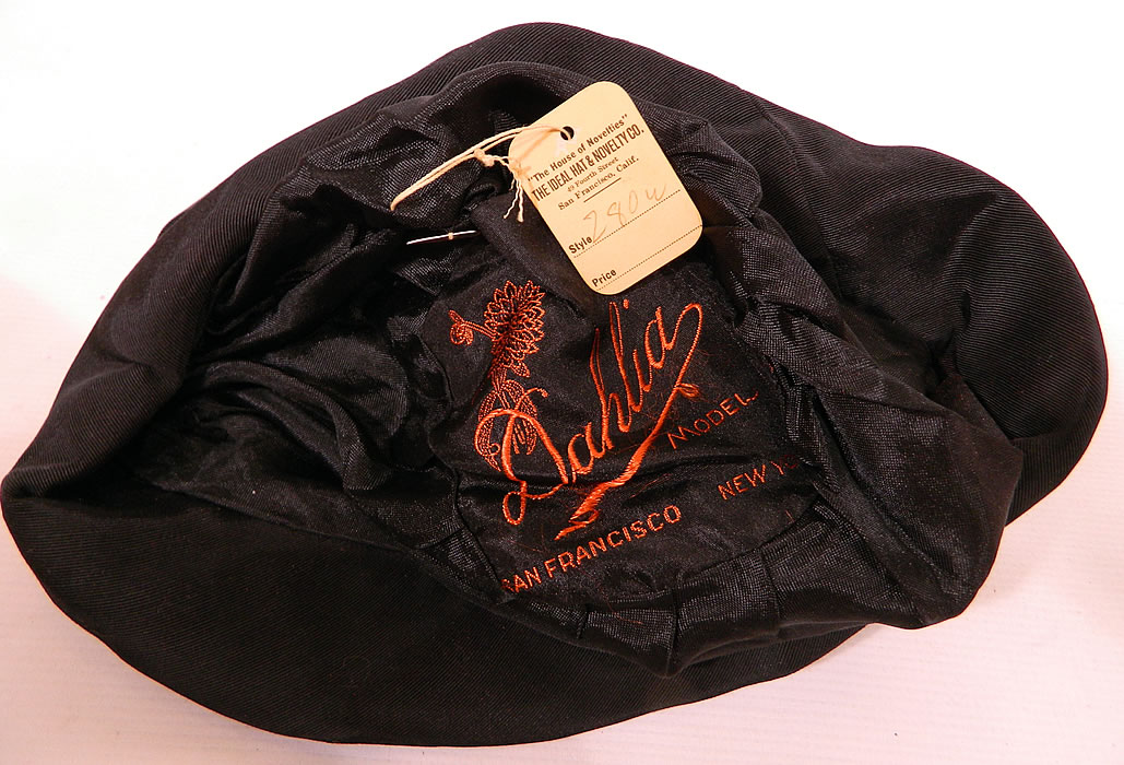 Vintage Dahlia Model Black Silk Velvet Gold Lame Lamé Embroidered Flapper Cloche Hat. This fabulous flapper cloche style hat is form fitting, with an uneven floppy brim and is fully lined inside with black silk and a "Dahlia Model San Francisco" label and original store tag attached. 