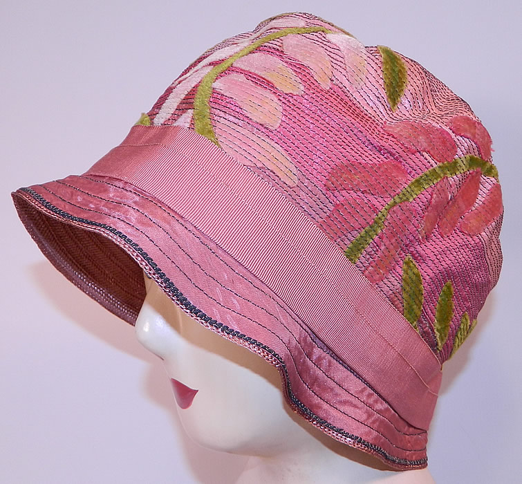 Vintage Art Deco Pink Silk Burnout Voided Velvet Floral Quilted Flapper Cloche Hat
It is made of a pink silk fabric, with a pastel floral burnout voided velvet design and decorative quilted stitching. 