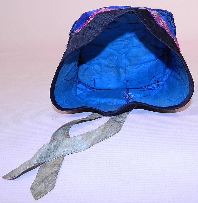 Antique Chinese Child Infant Silk Embroidered Butterfly Wind Hat Cap
This child's wind hat has a round pill box cap shape, lined in blue fabric. The hat measures 17 inches in circumference inside. It is in good condition, with only some missing black soutache embroidery stitching in areas. This is truly a beautiful piece of one of a kind antique Chinese textile art and would make for a wonderful display piece! 