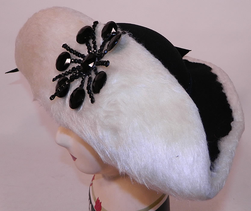 Vintage Leon Hats NY Label Black & White Felt Fur Jet Beaded Trim Tricorn Hat
This vintage Leon Hats New York label black and white felt fur jet beaded trim tricorn hat dates from the 1940s.