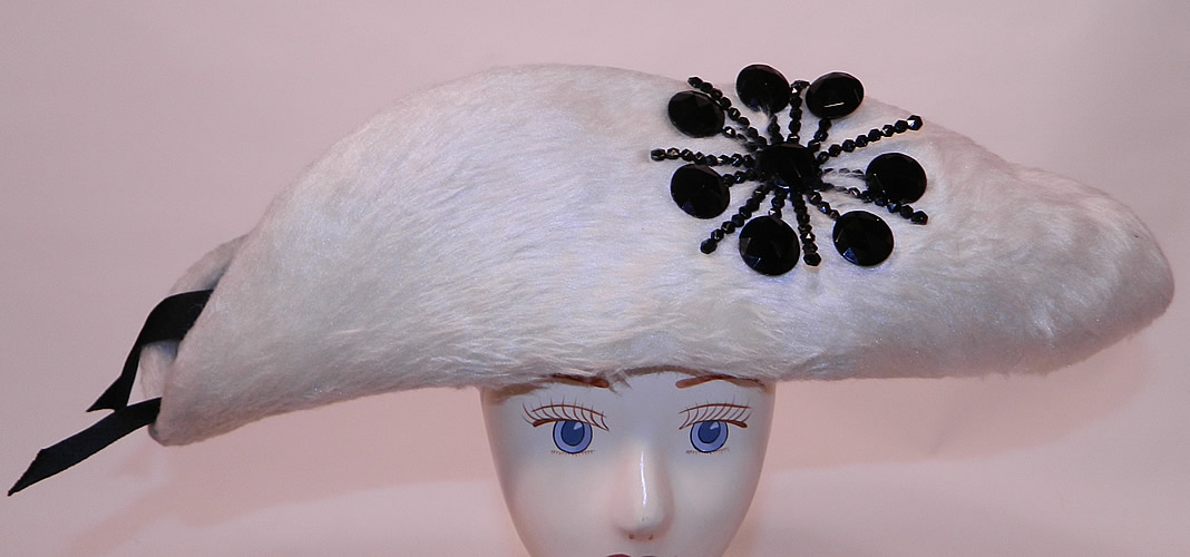 Vintage Leon Hats NY Label Black & White Felt Fur Jet Beaded Trim Tricorn Hat
It is made of a black wool felt fabric and a white plush faux beaver felt fur fabric. 