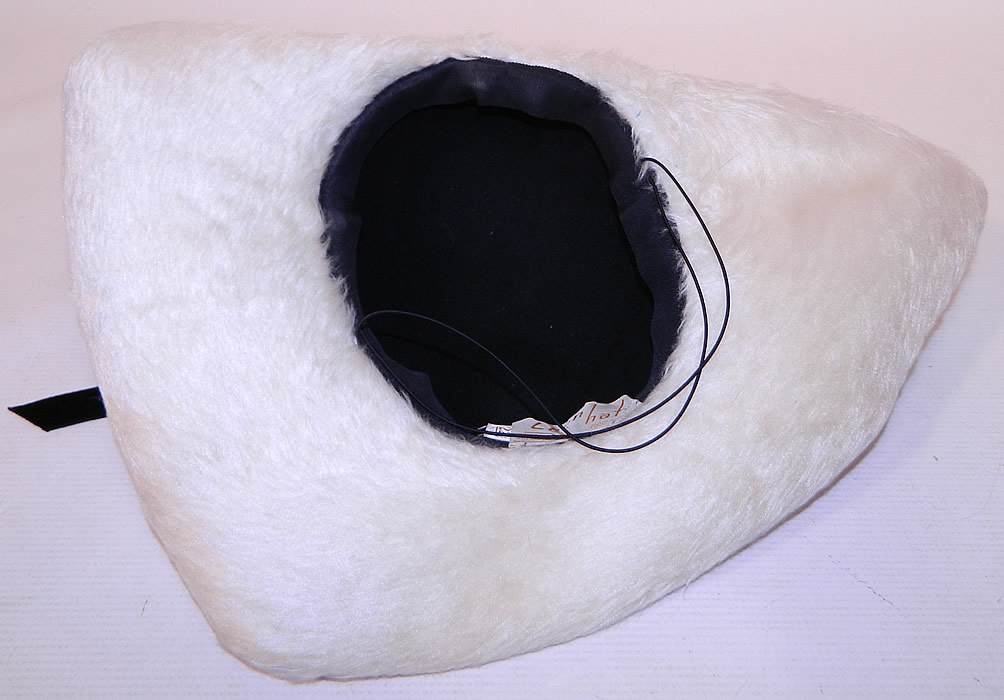 Vintage Leon Hats NY Label Black & White Felt Fur Jet Beaded Trim Tricorn Hat
The hat measures 22 1/2 inches in circumference inside the crown and 47 inches outside.
It is in excellent condition. This is truly a wonderful piece of wearable millinery art! 