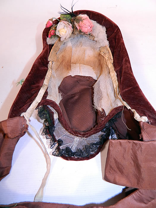 Victorian Civil War Brown Velvet Silk Roses Black Chantilly Lace Trim Drawn Spoon Bonnet.
 It is in good condition, with only some minor wear and yellowing discoloration staining inside on the lining. This is truly a wonderful piece of wearable Victoriana millinery art! 