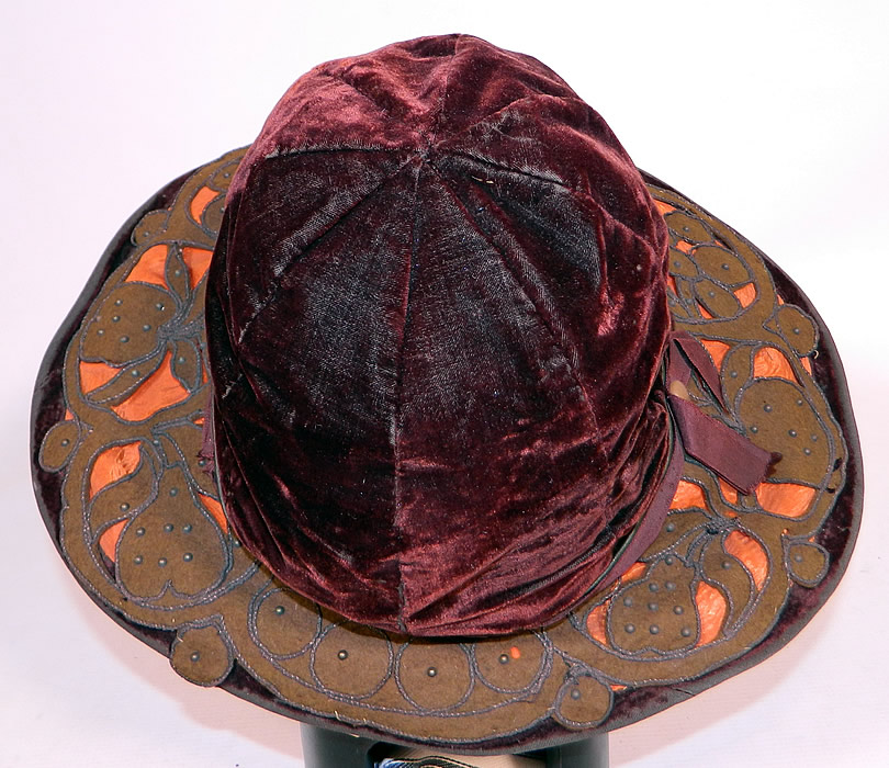 Vintage Burgundy Velvet Orange Silk Brown Cutwork Beaded Trim Wide Brim Cloche Hat
It is fully lined in a black silk fabric inside the crown.