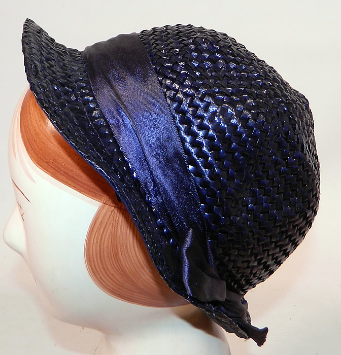 Vintage Navy Blue Woven Straw Red Cherry Silk Ribbon Bow Trim Childs Cloche Hat
The hat measures 19 1/2 inches inside circumference. 