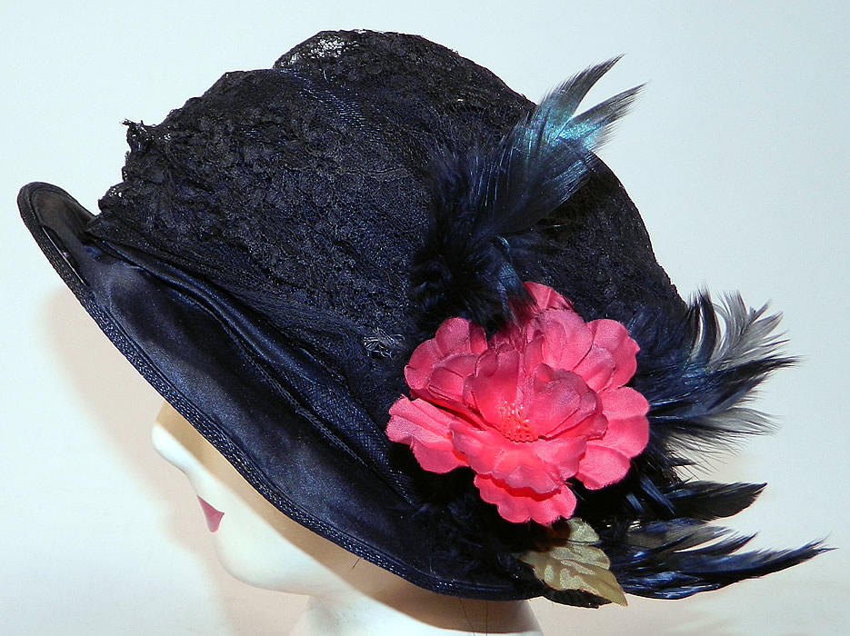 Vintage  Black Woven Straw Silk Lace Red Flower Feather Trim Flapper Cloche Hat
The hat is made of black woven horse hair and straw base, with black silk trim edging the outer brim and a sheer black lace fabric covering the crown. 