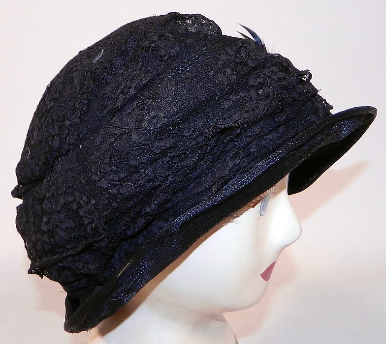 Vintage  Black Woven Straw Silk Lace Red Flower Feather Trim Flapper Cloche Hat
The hat measures 22 inches inside circumference. It is in good condition. This is truly a wonderful piece of wearable Art Deco textile art!