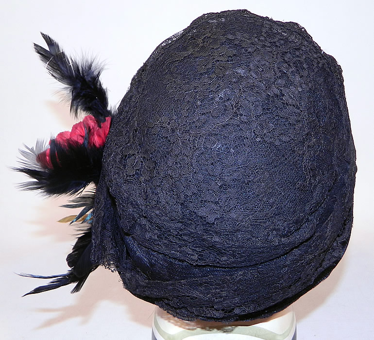 Vintage  Black Woven Straw Silk Lace Red Flower Feather Trim Flapper Cloche Hat
There is a red flower and iridescent black feather trim on the side. 