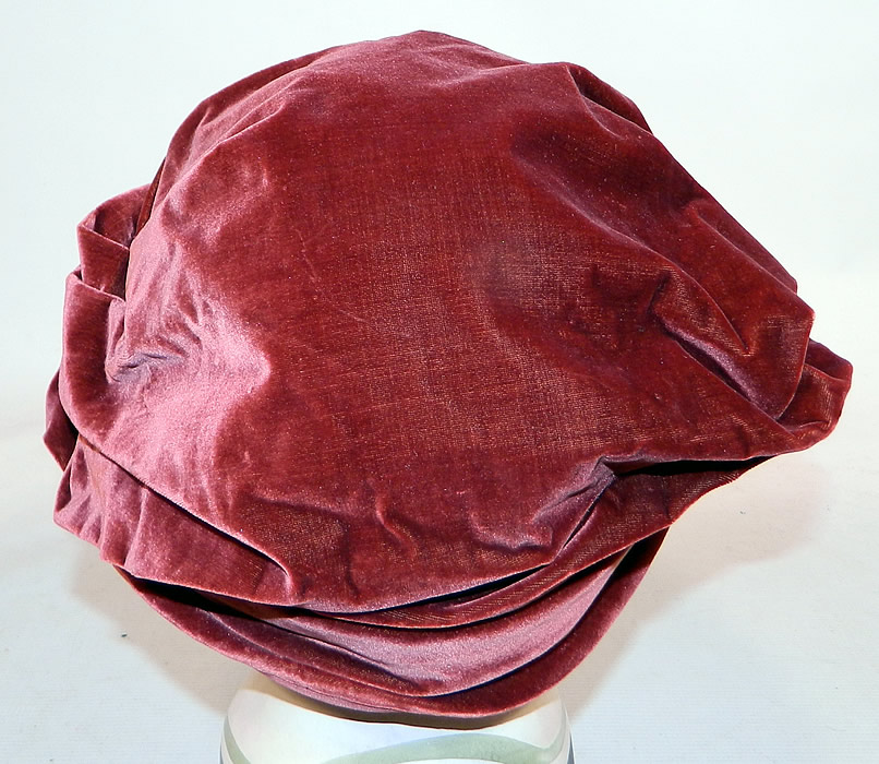 Vintage Art Deco Burgundy Red Silk Velvet Wrapped Turban Toque  Cloche Hat
The hat measures 22 1/2 inches inside crown circumference. It is in good condition. This is truly a wonderful piece of quality made wearable millinery art!