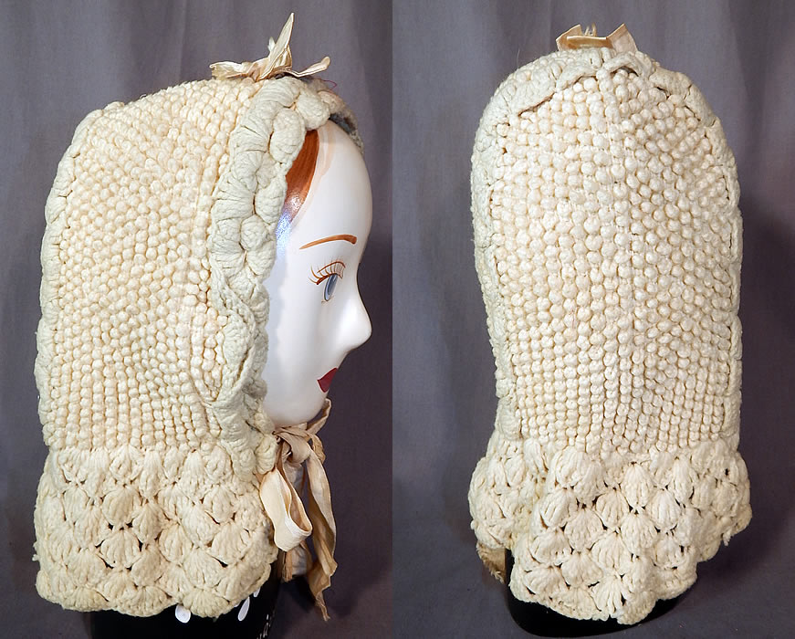 Victorian White Wool Hand Knit Nubby Crochet Winter Sled Carriage Bonnet
This women's winter bonnet hood would have been worn for travel in a sled or carriage and has a sun bonnet style with a long curtain cape ruffle back drape for warmth, drawstring gathering ties inside around the face and under the chin and is unlined.