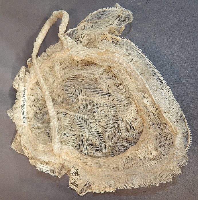 Victorian Civil War Era Antique Cream Net Lace Bed Cap Morning Bonnet Hat
The cap measures 20 inches in circumference, with a 12 1/2 inch long chin strap.