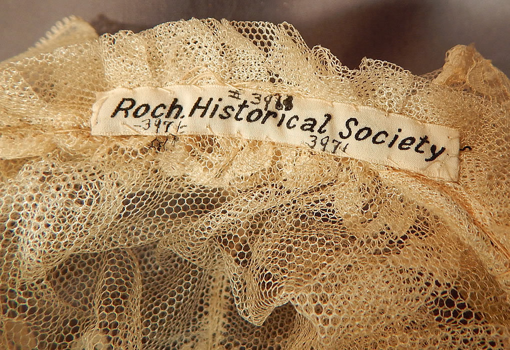 Victorian Civil War Era Antique Cream Net Lace Bed Cap Morning Bonnet Hat
It is in good condition, with only a few tiny pin holes in the net lace. The bonnet is a museum deaccession piece from the Rochester Historical Society (see closeup of labeled tag inside). This is truly a wonderful piece of wearable antique early Victoriana lace art! 