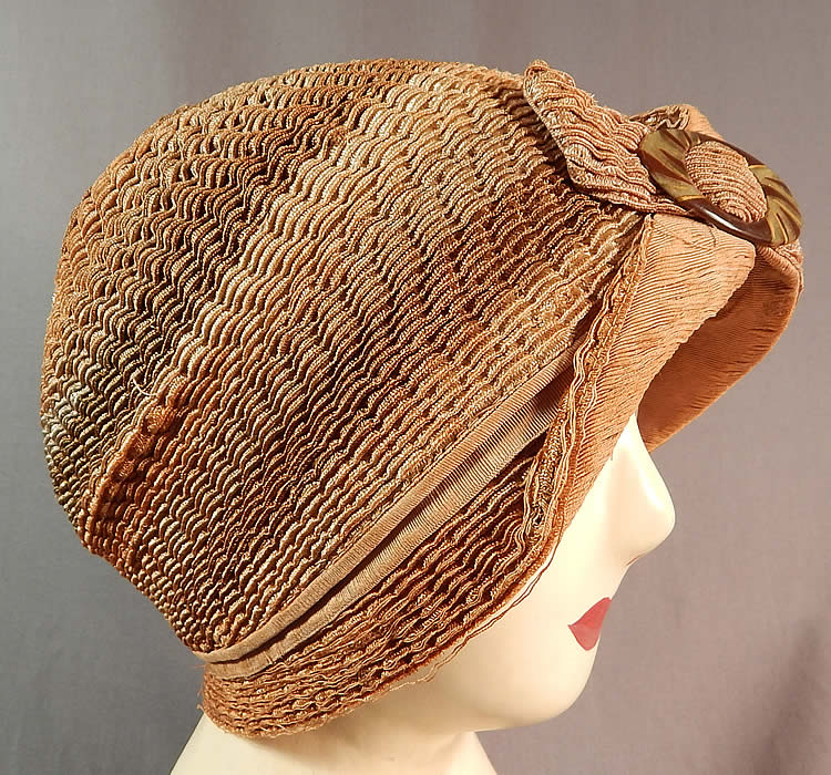 Vintage Art Deco Striped Brown Ombre Woven Straw Flapper Cloche Hat & Buckle
There is a decorative two tone brown celluloid buckle trim on the front. 