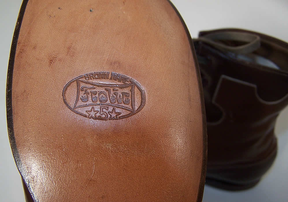 Unworn Edwardian Two Tone Brown Leather High Top Lace-up Youth Boots sole Close up.