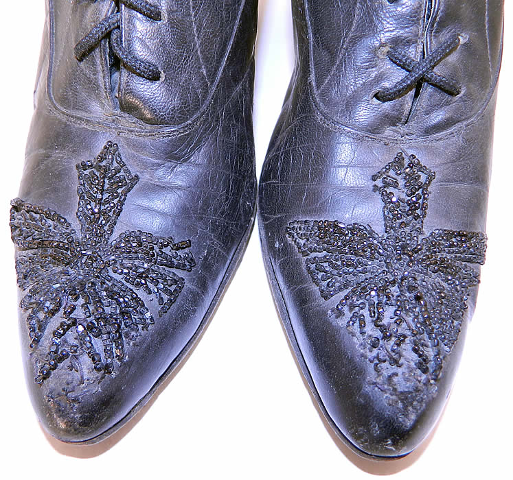 Victorian Antique Black Leather Jet Beaded High Top Lace-up Boots beading close up. They are made of black leather, with jet beaded trim on the front toes.