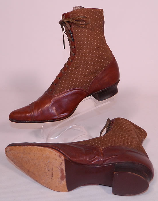 Victorian Brown Brocade Wool & Leather Two Tone High Top Lace-up Boots. They have been gently worn and are in good condition, with only some minor wear to the leather with faint discoloration. These are truly a rare and beautiful quality made boots! 