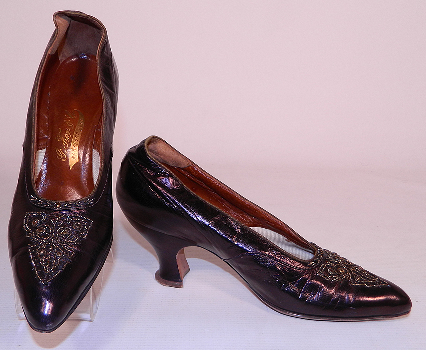 Vintage G. Fox & Co.  Edwardian Titanic Era Iridescent Aubergine Bronze Beaded Shoes. This pair of vintage G. Fox & Co. Edwardian Titanic era iridescent aubergine bronze beaded shoes date from 1912. They are made of an iridescent dark purplish brown aubergine eggplant color leather, with steel cut bronze beading done in a decorative pattern design on the front toes vamps and instep.