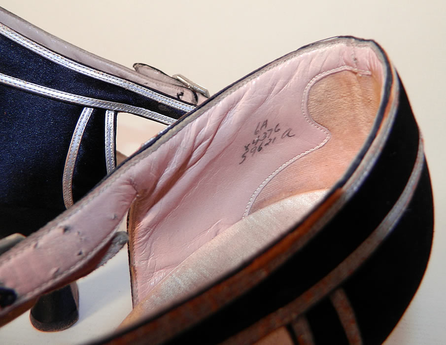 Vintage Saks Fifth Avenue Art Deco Silver Lamé Black Satin T-Strap Shoes. They have been gently worn and are in good condition, with only some wear along the silver leather trim. These are truly a wonderful piece of Art Deco textile art! 