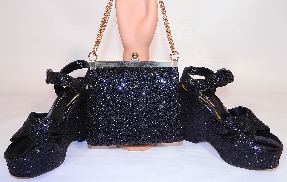 Vintage Miles Black Glitter Disco Platform Shoes & Purse Set. This pair of vintage Miles black glitter disco platform shoes and purse set date from the 1970s. They are covered and encrusted with a black sequin glitter.