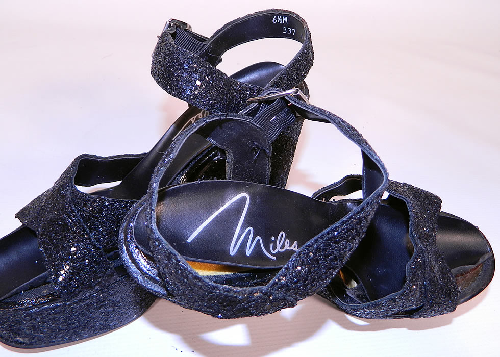 Vintage Miles Black Glitter Disco Platform Shoes & Purse Set. They are stamped inside "Miles" Made in Italy, a size 6 1/2 M.