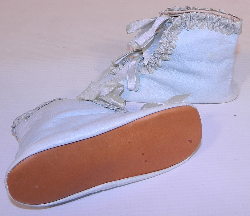 Unworn Victorian Antique Blue Kid Leather Silk Ribbon Baby Boots Infant Shoes. They are in good condition, with only some slight faint fade discoloration and appear to have never been worn. These  are truly a wonderful quality made shoe and would make a charming display piece! 