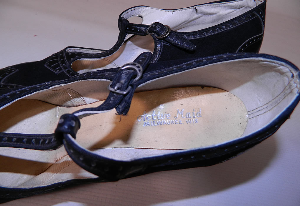 Unworn Vintage Active Maid  Brand Black Suede Leather  T-Strap Shoes. They have an "Active Maid Milwaukee, Wis." label stamped inside. 