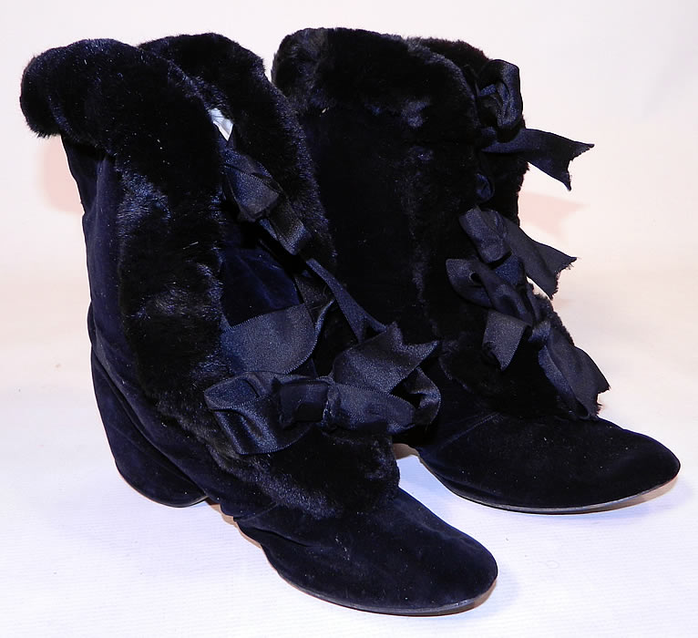 Victorian Black Velvet Fur Trim Winter Carriage Boots. This pair of antique Victorian era black velvet fur trim winter carriage boots date from 1900. They are made of a black plush velvet fabric, with a soft black fur trim edging down the front and around the tops. 