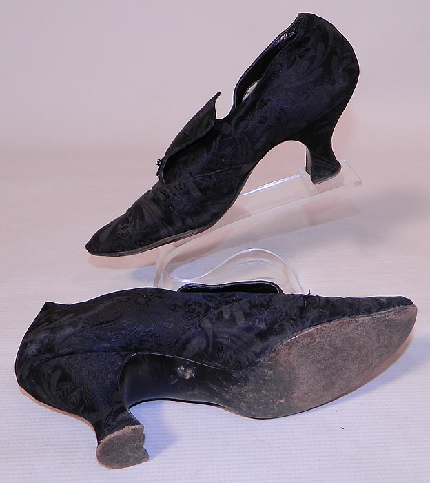 Vintage JW Robinson Co Los Angeles Edwardian Black Silk Damask Brocade Tongue Shoes. The shoes measure 10 inches long, 2 1/2 inches wide, with a 2 1/2 inch high heel. 