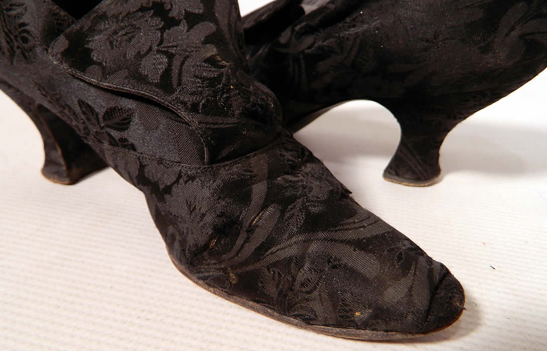 Vintage JW Robinson Co Los Angeles Edwardian Black Silk Damask Brocade Tongue Shoes. They have been gently worn and are in good condition, with only a few tiny frayed splits in the silk fabric (see close-up). These are truly a wonderful unique quality made shoe!