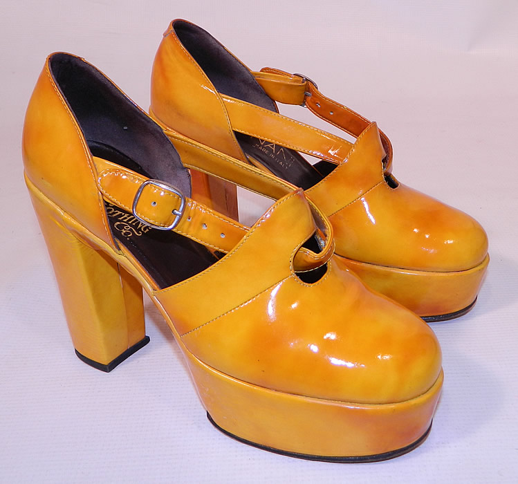 Vintage Mignani Right Bank Clothing Yellow Patent Leather  Platform Shoes. This pair of vintage Mignani Right Bank Clothing yellow patent leather platform shoes date from the 1970s. The shoes measure 9 1/2 inches long, 3 inches wide, with 4 1/2 inch high heels. 